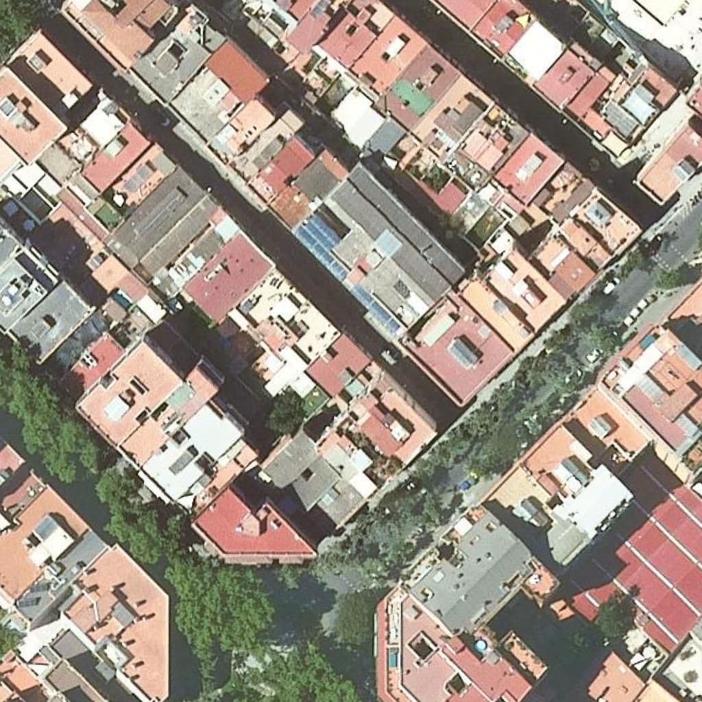 Вид згори на територію школи «Llar D'infants El Camí Feliç Poble Nou»