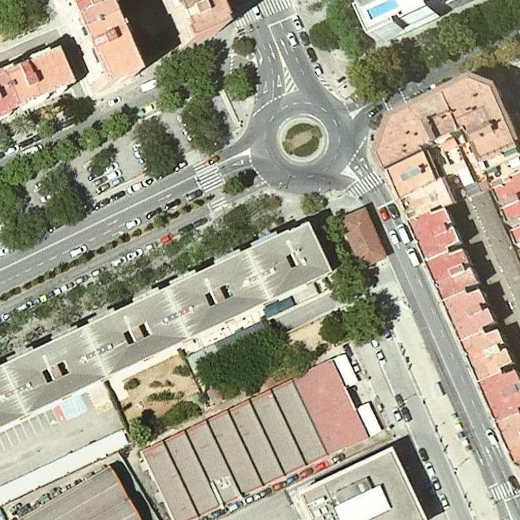 Вид згори на територію школи «Llar D'infants Casa Dels Arbres»
