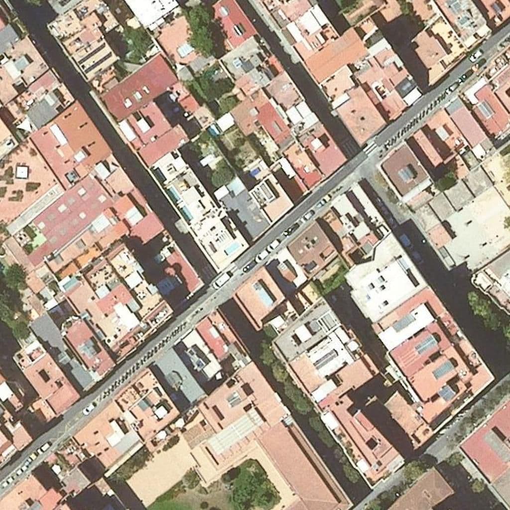 Вид згори на територію школи «Lli Privada Pam I Pipa De Gràcia»