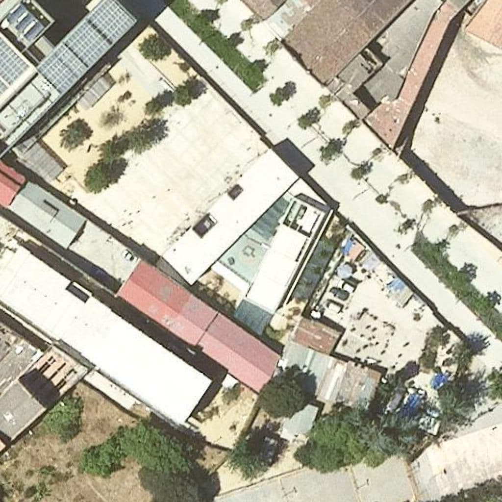 Вид згори на територію школи «Escola Bressol Municipal Leonor Serrano»